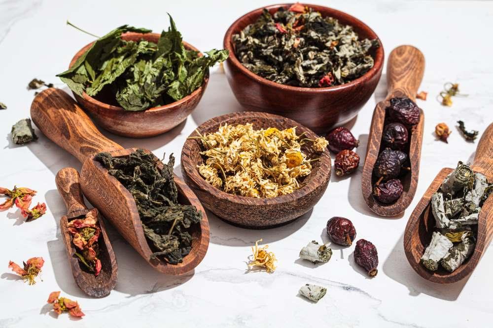 Ayurvedic herbs and mortar in greenery